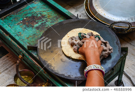Making Roti bread at local restaurant Making Roti bread at local restaurant 46888996
