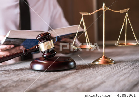 Male lawyer or judge working with Law books, gavel and balance, Male lawyer or judge working with Law books, gavel and balance, 46889961
