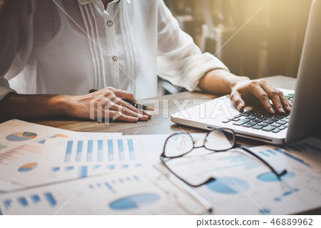 Professional at work, business woman working and analysis on lap Professional at work, business woman working and analysis on lap 46889962