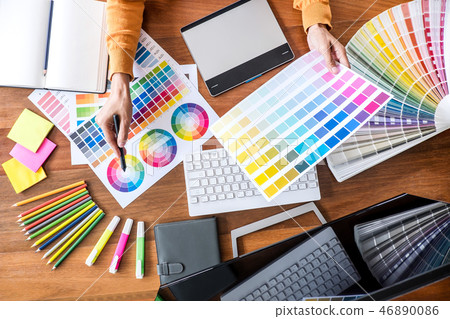 Image of female creative graphic designer working on color selec Image of female creative graphic designer working on color selec 46890086
