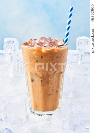 Summer drink ice coffee with cream in a tall glass Summer drink ice coffee with cream in a tall glass 46892900