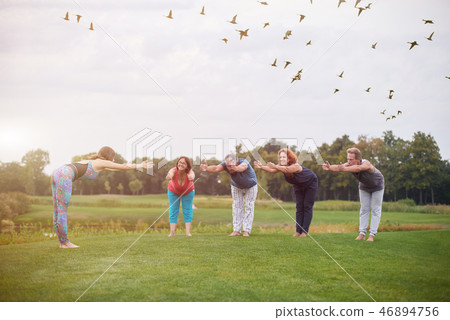 Group healthy fitness exercise outdoor. Group healthy fitness exercise outdoor. 46894756