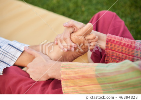 Close up hands massaging foot. 46894828