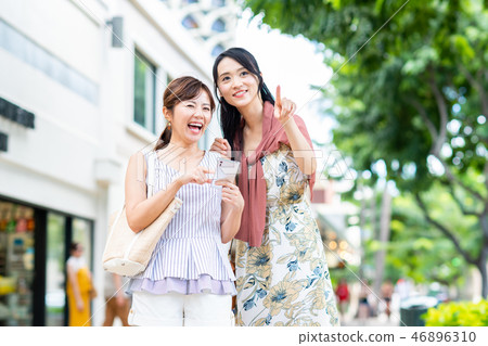 A young lady (a smartphone) 46896310