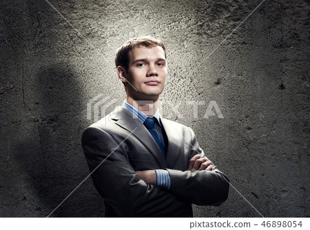 Confident businessman Confident businessman 46898054