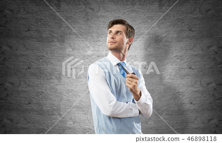 Conceptual image of young businessman. Conceptual image of young businessman. 46898118