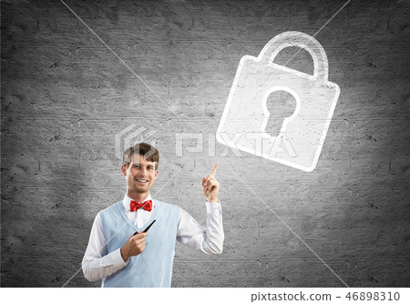 Elegant banker wearing red tie and lock sign as safety concept Elegant banker wearing red tie and lock sign as safety concept 46898310