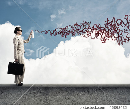 Woman using spray Woman using spray 46898483