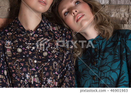 collar clothing with pattern dressed on two girls close up collar clothing with pattern dressed on two girls close up 46901983