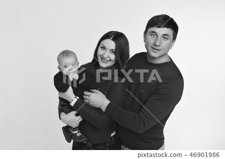 baby on the hands of parents on a white background. baby on the hands of parents on a white background. 46901986
