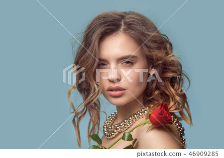 Beautiful young girl in studio with pearl jewelry - earrings, bracelet, necklace. 46909285