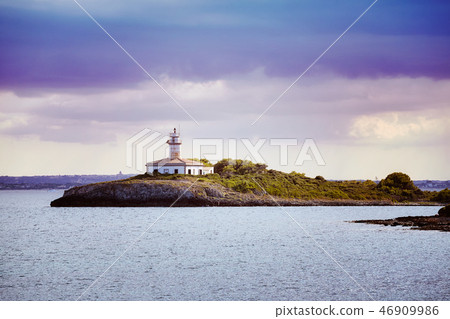 Alcanada Lighthouse at sunset, Spain. 46909986