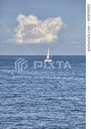 Lonely yacht on the horizon. Lonely yacht on the horizon. 46909988