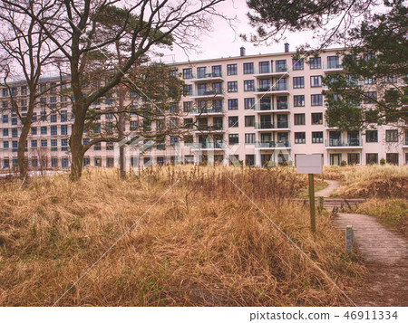 Concrete Building with broken windows at Prora, Concrete Building with broken windows at Prora, 46911334