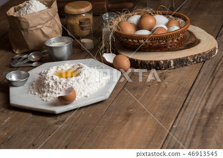 baking ingredients on wooden background  46913545