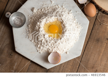 eggs on flour with copy space eggs on flour with copy space 46913546