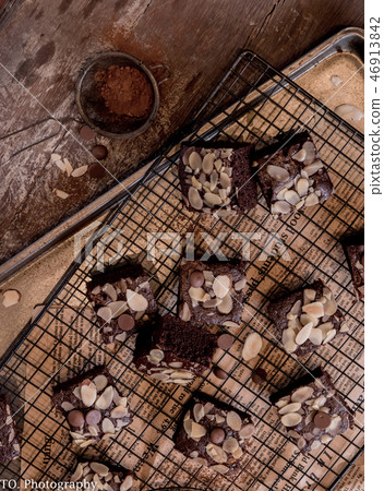 almond brownies on tray with cocoa powder almond brownies on tray with cocoa powder 46913842