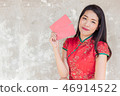 asian woman wearing red traditional dress holding  46914522