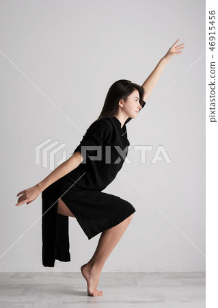 Sporty young woman doing yoga practice on white background - concept of healthy life and natural Sporty young woman doing yoga practice on white background - concept of healthy life and natural 46915456