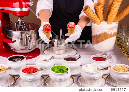 Confectionery powder on horns with ice cream Confectionery powder on horns with ice cream 46915537