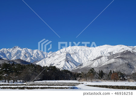 Winter Northern Alps seen from Hakuba Village 46916258