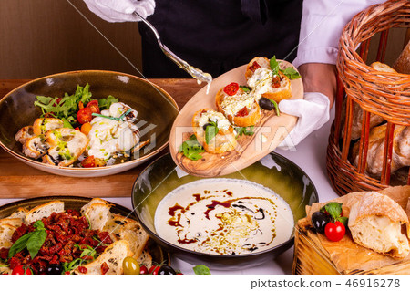 Cheese sauce on the crackling toasts with tomatoes Cheese sauce on the crackling toasts with tomatoes 46916278