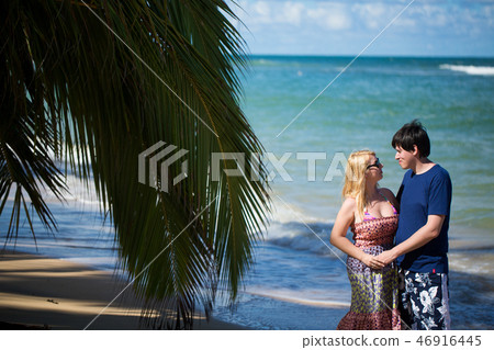 Young sexy blonde woman and man at romantic date at vacation Young sexy blonde woman and man at romantic date at vacation 46916445