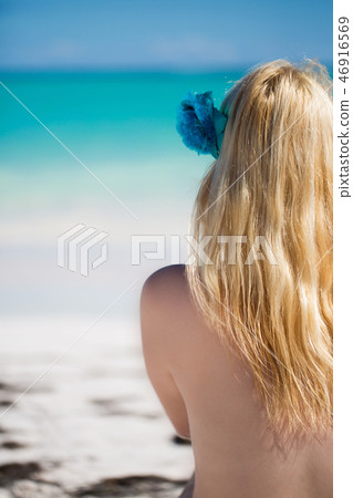 Young sexy blonde woman in bikini near sea Young sexy blonde woman in bikini near sea 46916569