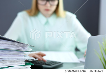 Bookkeeper or financial inspector  making report, calculating or checking balance. Audit and ta 46916621