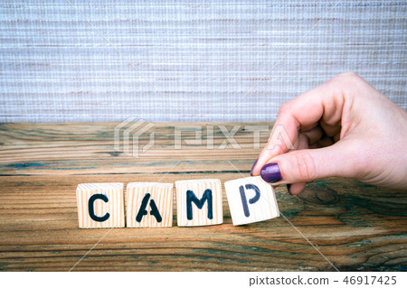 Camp. Wooden letters on the office desk 46917425