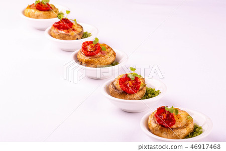 Portion giving of snack from mushrooms 46917468