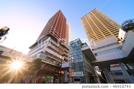 Tokyo cityscape in Japan High-rise apartments in front of Nippori Station reflected in sunlight 46918743