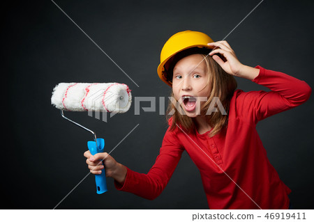 Decoration, renovation and reconstrucion concept. Painting girl 46919411