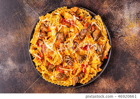 Pasta with chicken liver sauce. 46920661