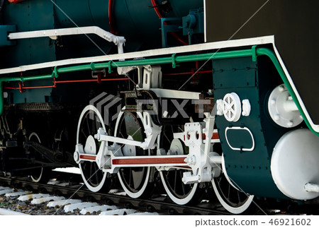 Closeup antique vintage train locomotive.  46921602