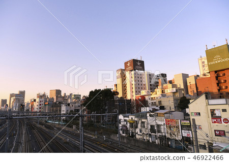 Tokyo cityscape in Japan I look at the hotel area that spreads in front of Kuwaya station in the evening sun Tokyo cityscape in Japan I look at the hotel area that spreads in front of Kuwaya station in the evening sun 46922466