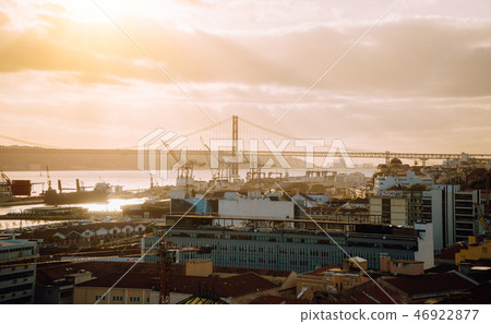 Lisbon panoramic view. Tagus river, the bridge and the shipyard at sunsetlight. Portugal 46922877