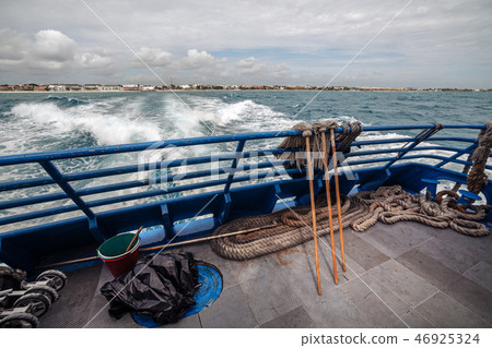 Mops, bucket and rope at the stern of the boat Mops, bucket and rope at the stern of the boat 46925324
