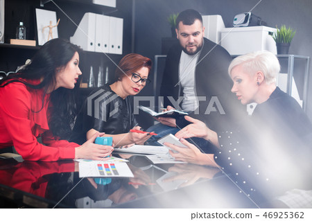 Office workers discuss their project over Cup of tea 46925362