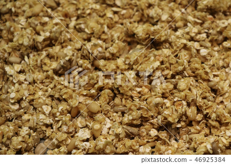 Organic homemade Granola Cereal with oats and almond. Texture oatmeal granola or muesli as Organic homemade Granola Cereal with oats and almond. Texture oatmeal granola or muesli as 46925384