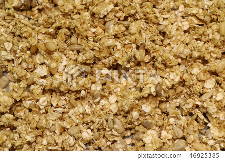 Organic homemade Granola Cereal with oats and almond. Texture oatmeal granola or muesli as Organic homemade Granola Cereal with oats and almond. Texture oatmeal granola or muesli as 46925385