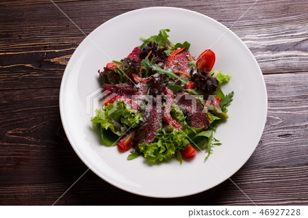 Fresh salad with natural ingredients. Fresh salad with natural ingredients. 46927228