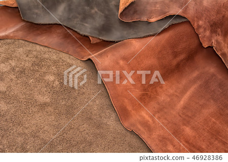 Texture of pieces brown leather. Natural material background 46928386