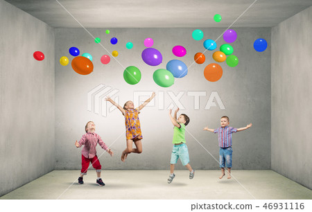 Playful children catch balloons Playful children catch balloons 46931116