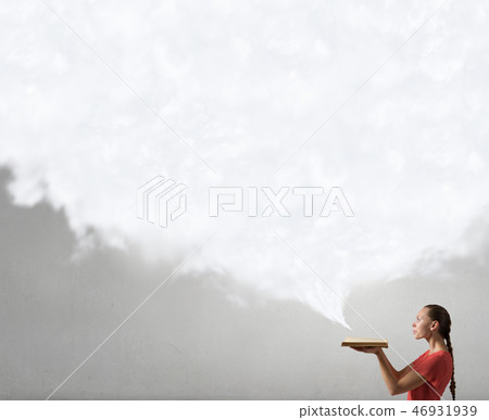 Attractive woman with book Attractive woman with book 46931939