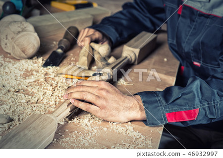 Carpenter at work 46932997
