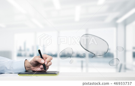 Male hands using graphics tablet and glass icons fly in air. Mix 46933737
