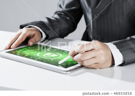 Internet security concept with woman working on media screen wit Internet security concept with woman working on media screen wit 46933858