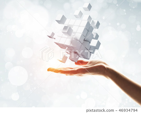 Cube white figure in male palm as symbol for integration. 3D rendering Cube white figure in male palm as symbol for integration. 3D rendering 46934794