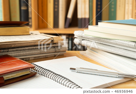 Bookshelves notebooks pile of material business research 46936946
